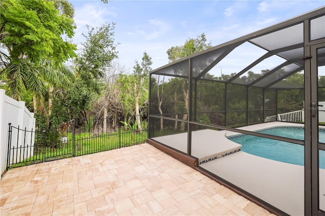 826 Addison Dr NE, Saint Petersburg, FL 33716 - outdoor pool with a patio and glass enclosure