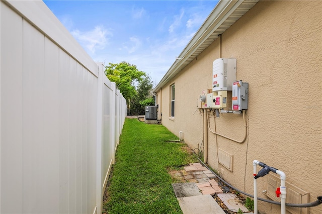 826 Addison Dr NE, Saint Petersburg, FL 33716 - view of side of home with stucco siding