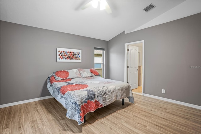 826 Addison Dr NE, Saint Petersburg, FL 33716 - bedroom with wood finished floors, lofted ceiling, and ceiling fan