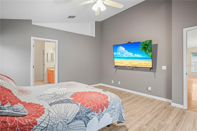 826 Addison Dr NE, Saint Petersburg, FL 33716 - bedroom with lofted ceiling, light wood-style floors, and a ceiling fan