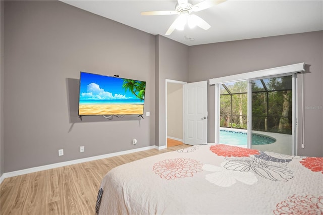 826 Addison Dr NE, Saint Petersburg, FL 33716 - bedroom featuring access to outside, wood finished floors, and ceiling fan