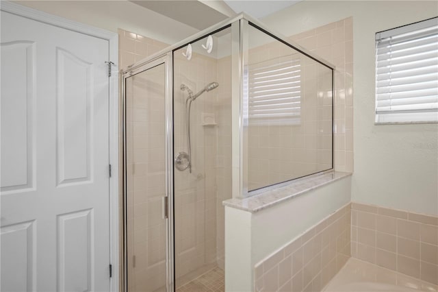 826 Addison Dr NE, Saint Petersburg, FL 33716 - full bathroom featuring a stall shower and a bath