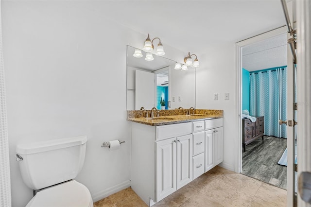 2424 W Tampa Bay Blvd Unit G204, Tampa, FL 33607 - ensuite bathroom with double vanity and tile patterned flooring