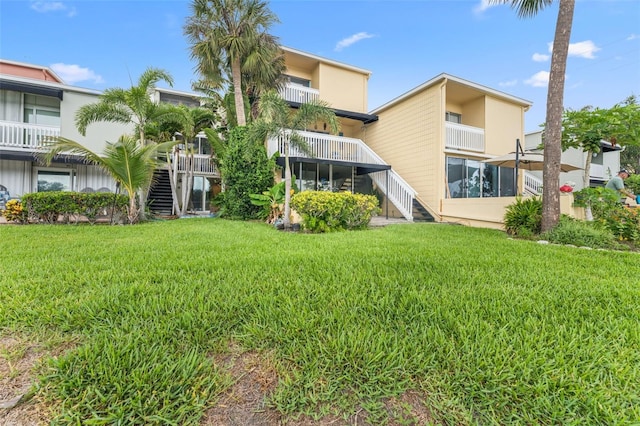 2424 W Tampa Bay Blvd Unit G204, Tampa, FL 33607 - view of building exterior featuring stairs