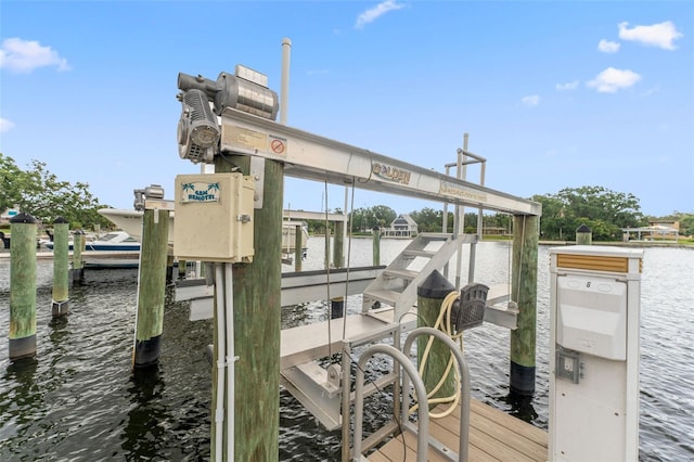 2424 W Tampa Bay Blvd Unit G204, Tampa, FL 33607 - dock with boat lift and a water view