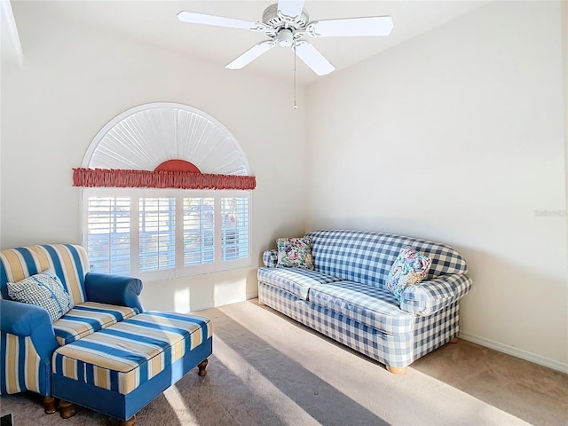 11620 Eastern Star Ct, New Port Richey, FL 34654 - living area featuring carpet floors, ceiling fan, and baseboards