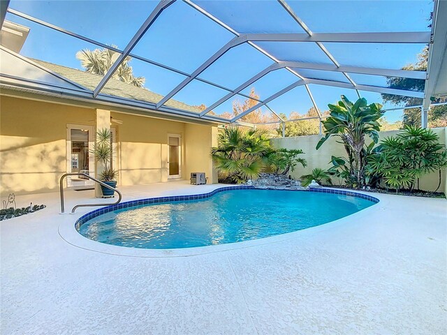 11620 Eastern Star Ct, New Port Richey, FL 34654 - swimming pool with a patio area and a lanai