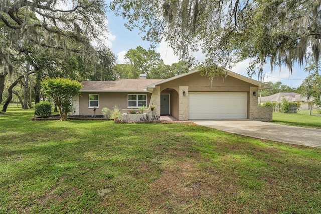 10614 Hudson Ave, Hudson, FL 34669 - ranch-style house featuring an attached garage, concrete driveway, and stucco siding
