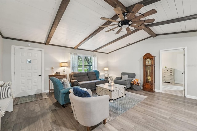 10614 Hudson Ave, Hudson, FL 34669 - living area featuring a ceiling fan, light wood finished floors, wood ceiling, and baseboards