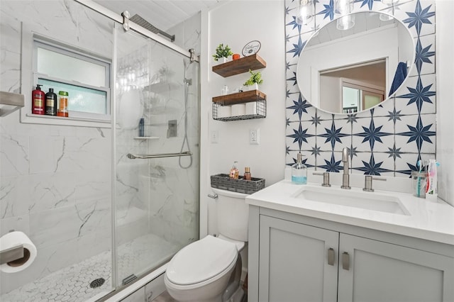 10614 Hudson Ave, Hudson, FL 34669 - full bath with toilet, a marble finish shower, vanity, and tasteful backsplash