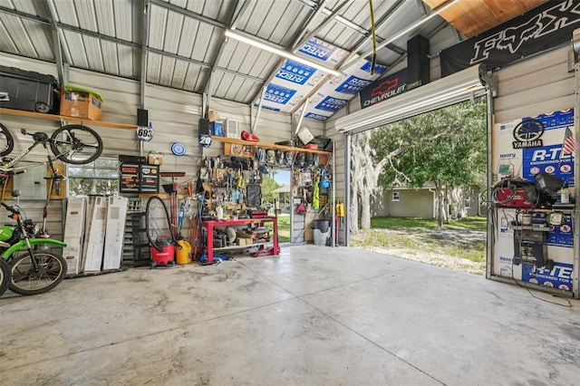 10614 Hudson Ave, Hudson, FL 34669 - garage featuring a workshop area