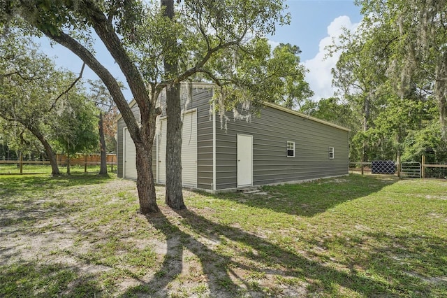 10614 Hudson Ave, Hudson, FL 34669 - view of home's exterior featuring an outbuilding