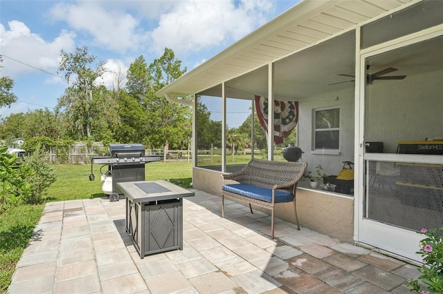 10614 Hudson Ave, Hudson, FL 34669 - view of patio / terrace featuring a fire pit, a ceiling fan, and a grill