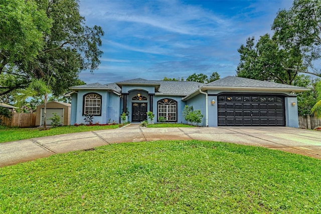22946 Brownwood Ct, Land O Lakes, FL 34639 - ranch-style home with a garage, concrete driveway, stucco siding, and a shingled roof