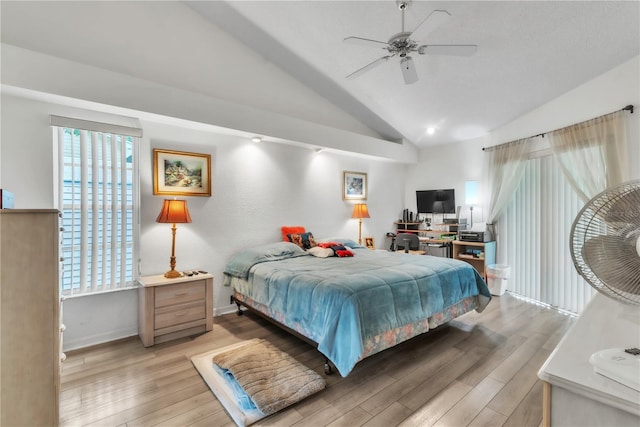 22946 Brownwood Ct, Land O Lakes, FL 34639 - bedroom with light wood finished floors, lofted ceiling, and a ceiling fan