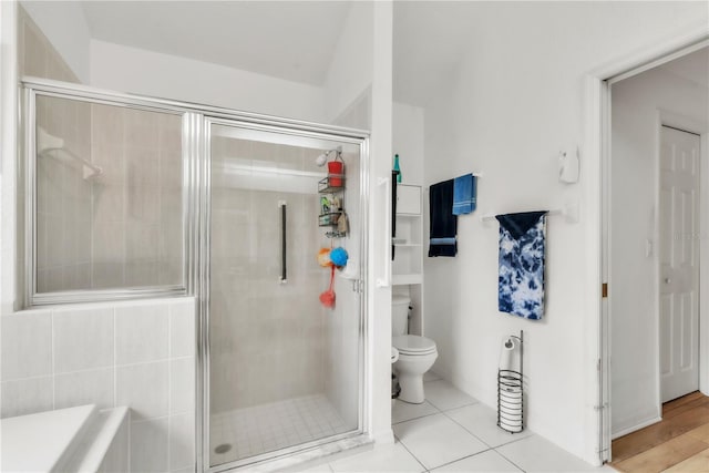 22946 Brownwood Ct, Land O Lakes, FL 34639 - bathroom with a shower stall and tile patterned floors