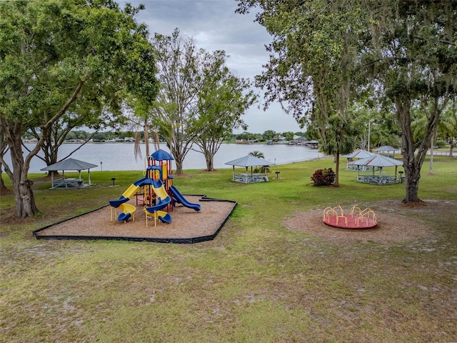 22946 Brownwood Ct, Land O Lakes, FL 34639 - community play area with a gazebo, a lawn, and a water view