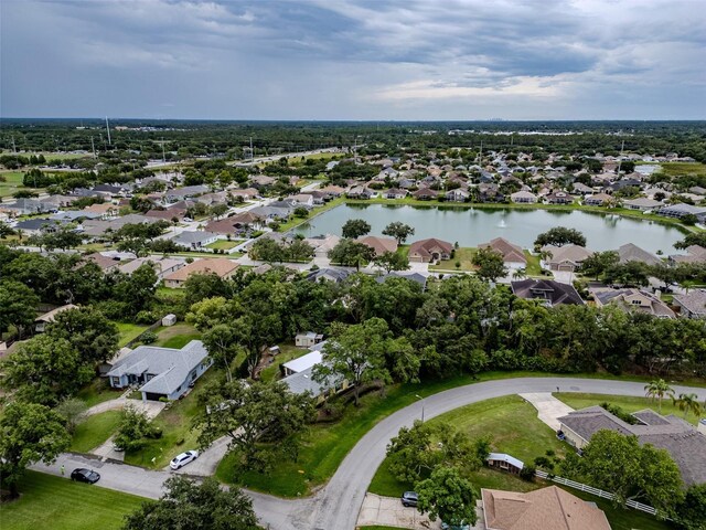 22946 Brownwood Ct, Land O Lakes, FL 34639 - aerial overview of property's location with nearby suburban area and a large body of water