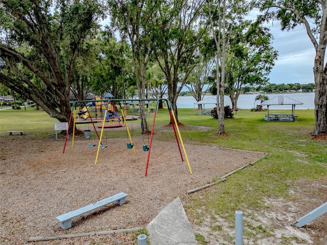 22946 Brownwood Ct, Land O Lakes, FL 34639 - community playground featuring a yard and a water view