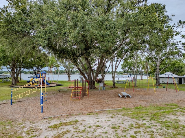 22946 Brownwood Ct, Land O Lakes, FL 34639 - communal playground featuring a lawn