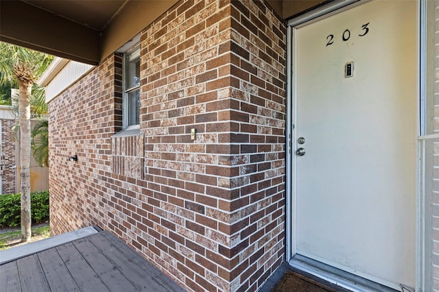 10423 Carrollbrook Cir Unit 203, Tampa, FL 33618 - view of exterior entry with brick siding