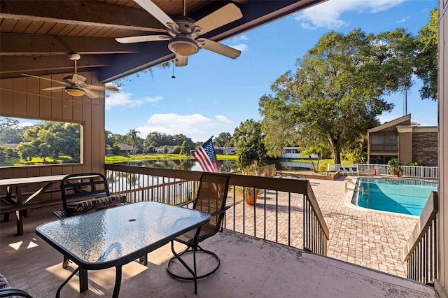 10423 Carrollbrook Cir Unit 203, Tampa, FL 33618 - view of patio with ceiling fan and a water view