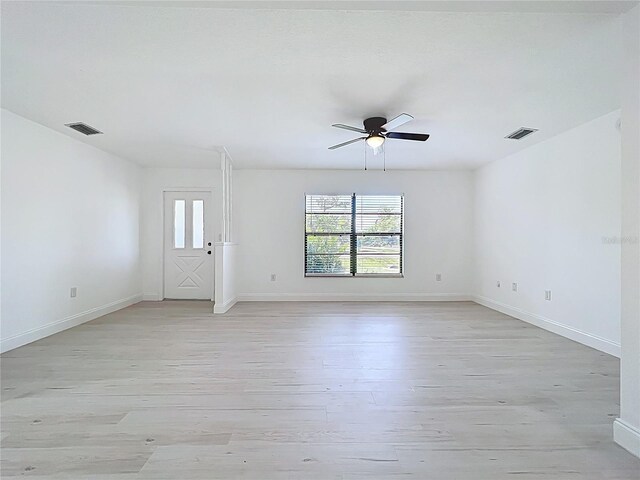 21426 Quesada Ave, Port Charlotte, FL 33952 - unfurnished room featuring light wood-style flooring and ceiling fan