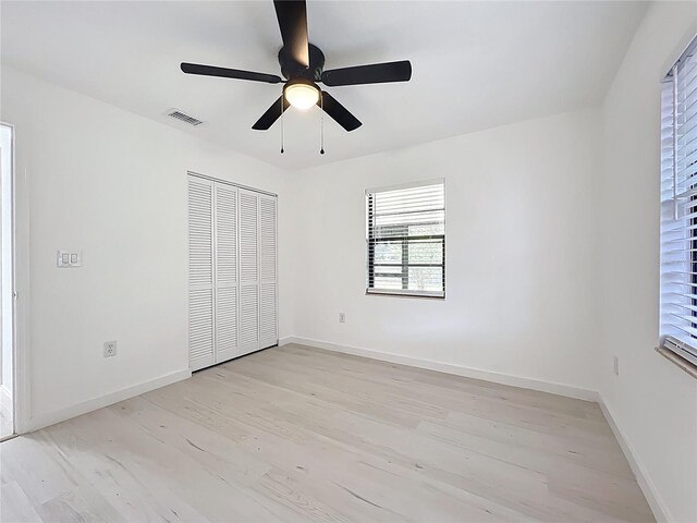 21426 Quesada Ave, Port Charlotte, FL 33952 - unfurnished bedroom featuring light wood-style flooring, a closet, and ceiling fan