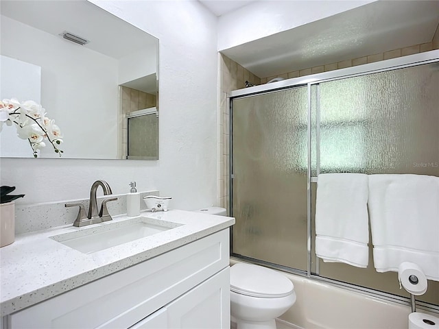 21426 Quesada Ave, Port Charlotte, FL 33952 - bathroom with vanity and shower / bath combination with glass door