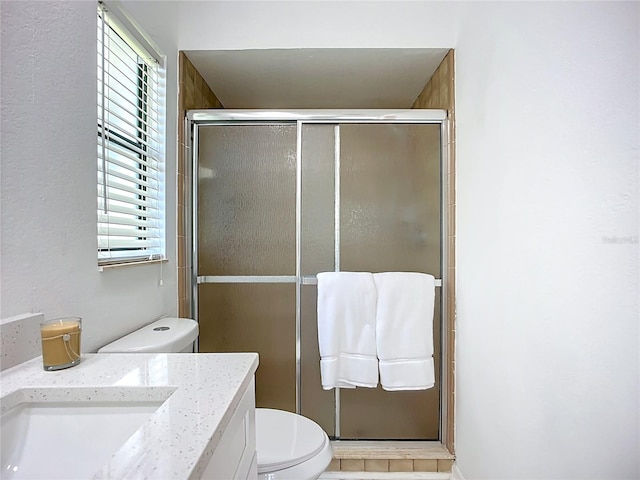 21426 Quesada Ave, Port Charlotte, FL 33952 - full bathroom featuring vanity, a stall shower, and plenty of natural light