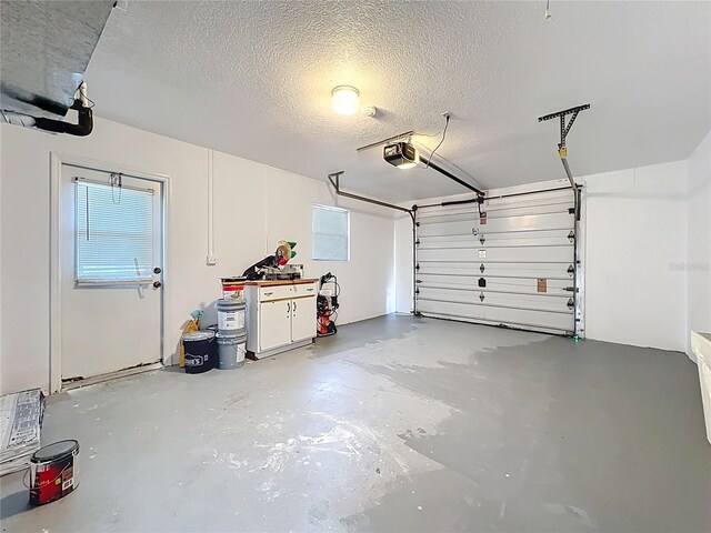21426 Quesada Ave, Port Charlotte, FL 33952 - garage featuring a garage door opener
