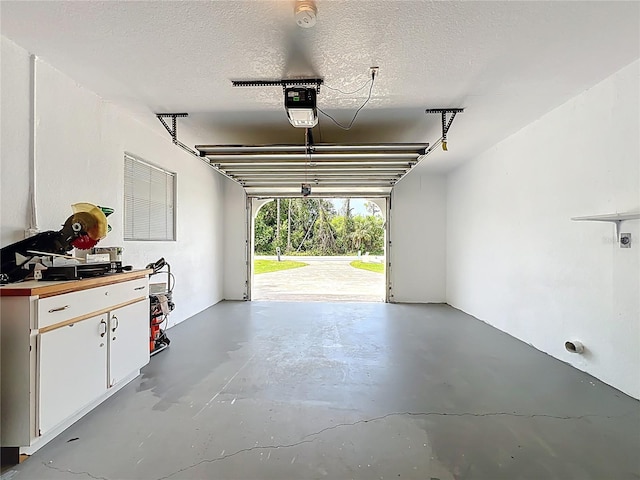 21426 Quesada Ave, Port Charlotte, FL 33952 - garage featuring a garage door opener