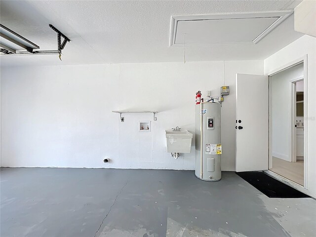 21426 Quesada Ave, Port Charlotte, FL 33952 - garage with electric water heater and a sink