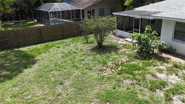 21426 Quesada Ave, Port Charlotte, FL 33952 - fenced yard featuring glass enclosure
