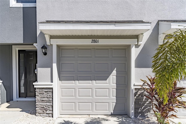 2801 Midnight Pearl Dr, Sarasota, FL 34240 - garage featuring concrete driveway
