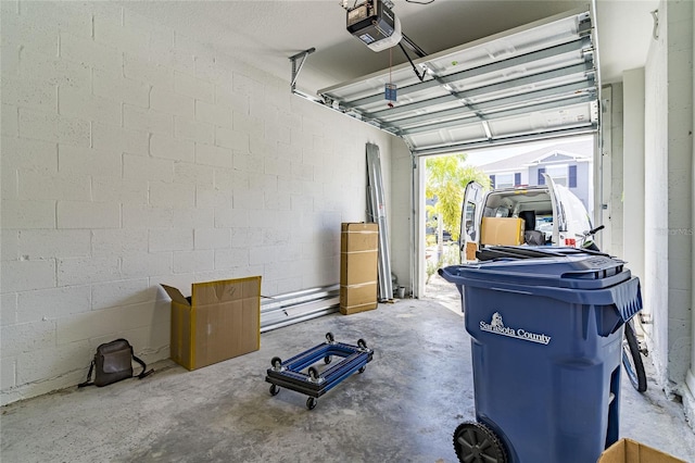 2801 Midnight Pearl Dr, Sarasota, FL 34240 - garage with a garage door opener