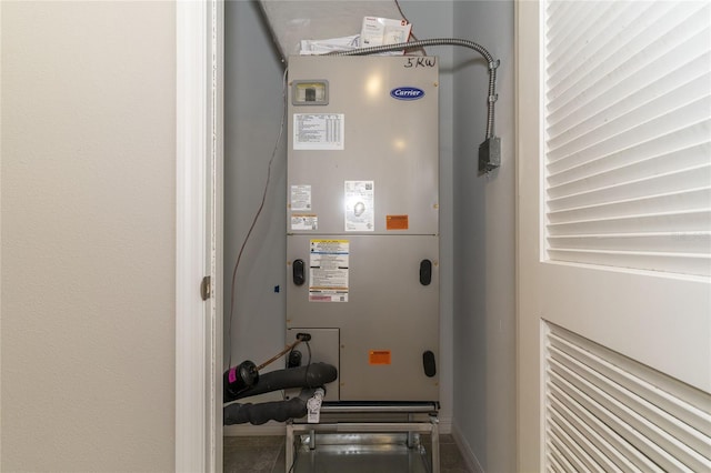 2801 Midnight Pearl Dr, Sarasota, FL 34240 - utility room featuring heating unit