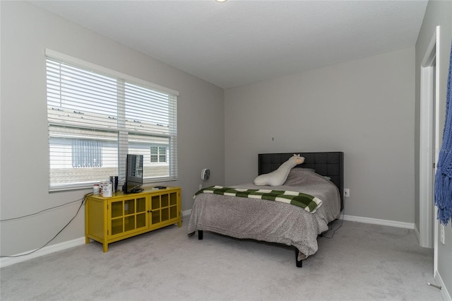 2801 Midnight Pearl Dr, Sarasota, FL 34240 - bedroom with light carpet and baseboards