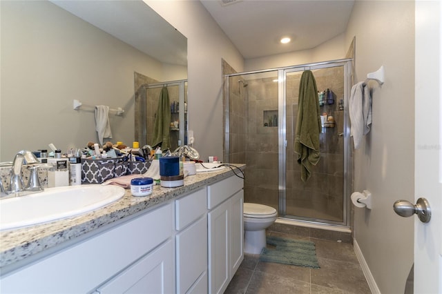 2801 Midnight Pearl Dr, Sarasota, FL 34240 - bathroom with double vanity, a shower stall, toilet, baseboards, and recessed lighting