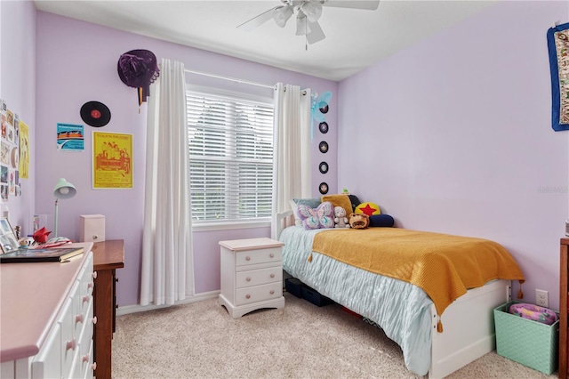 19418 Butterwood Ln, Lutz, FL 33558 - bedroom with light carpet, multiple windows, and baseboards
