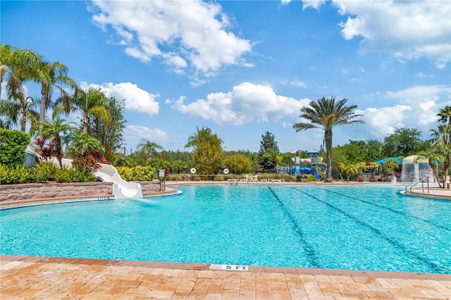 19418 Butterwood Ln, Lutz, FL 33558 - community pool featuring a water slide