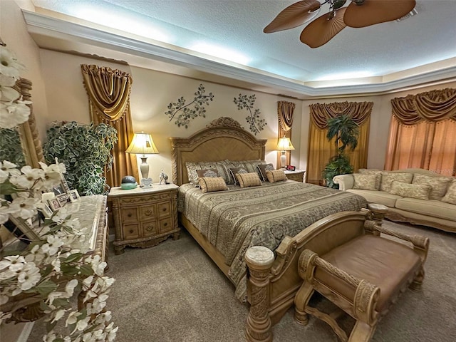 13807 Eagles Rock Ct, Hudson, FL 34667 - bedroom featuring light colored carpet, a ceiling fan, and a tray ceiling
