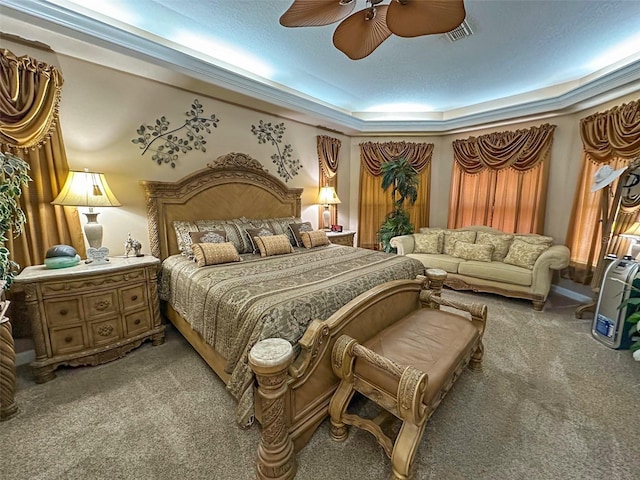 13807 Eagles Rock Ct, Hudson, FL 34667 - bedroom with light colored carpet, ceiling fan, and a raised ceiling