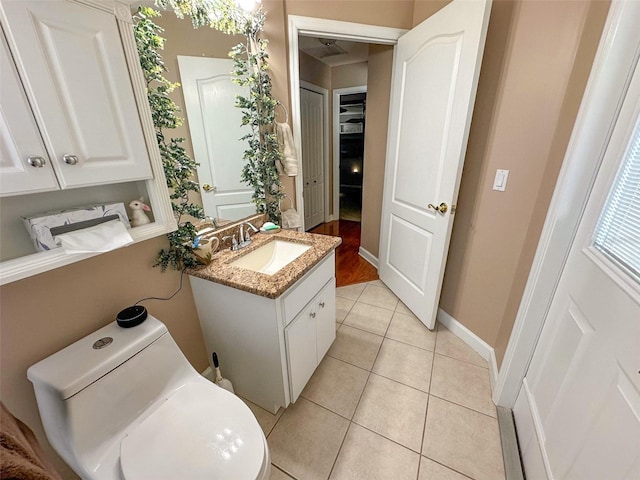 13807 Eagles Rock Ct, Hudson, FL 34667 - half bath featuring vanity, toilet, and tile patterned flooring