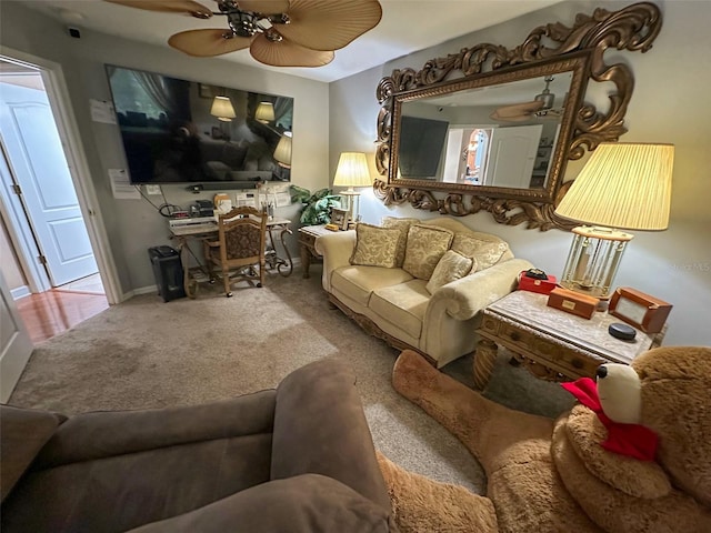 13807 Eagles Rock Ct, Hudson, FL 34667 - carpeted living room with ceiling fan and baseboards