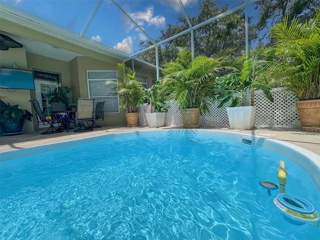 13807 Eagles Rock Ct, Hudson, FL 34667 - outdoor pool featuring glass enclosure