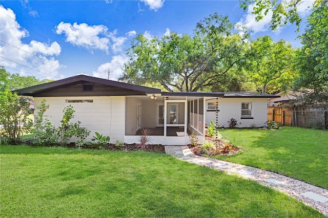 223 Pinehurst Dr, Auburndale, FL 33823 - ranch-style house with a sunroom