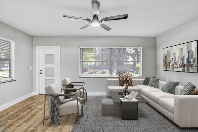 223 Pinehurst Dr, Auburndale, FL 33823 - living area featuring wood finished floors, healthy amount of natural light, and ceiling fan