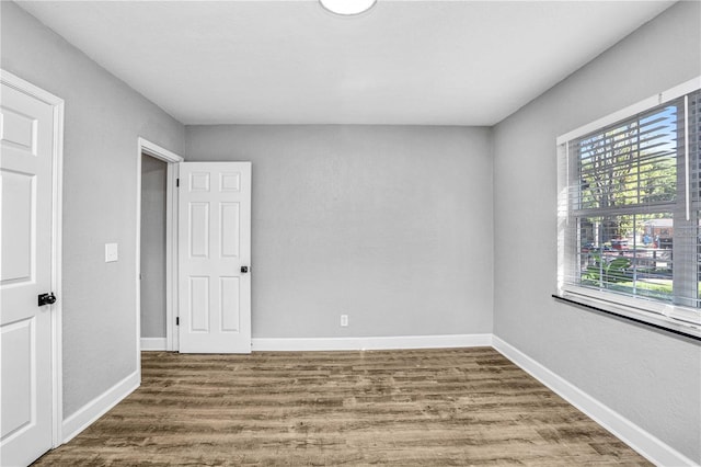 223 Pinehurst Dr, Auburndale, FL 33823 - empty room with wood finished floors