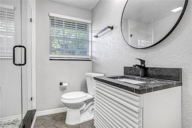 223 Pinehurst Dr, Auburndale, FL 33823 - full bath with vanity, a textured wall, a shower stall, and tile patterned floors